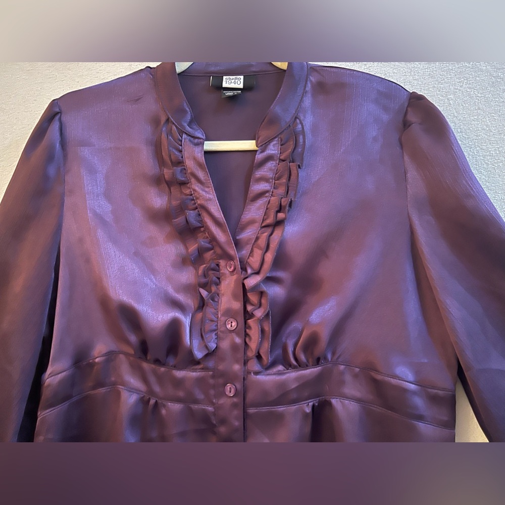 Woman’s size M, plum shirt v-neck button up by Studio 1940. Super flattering!